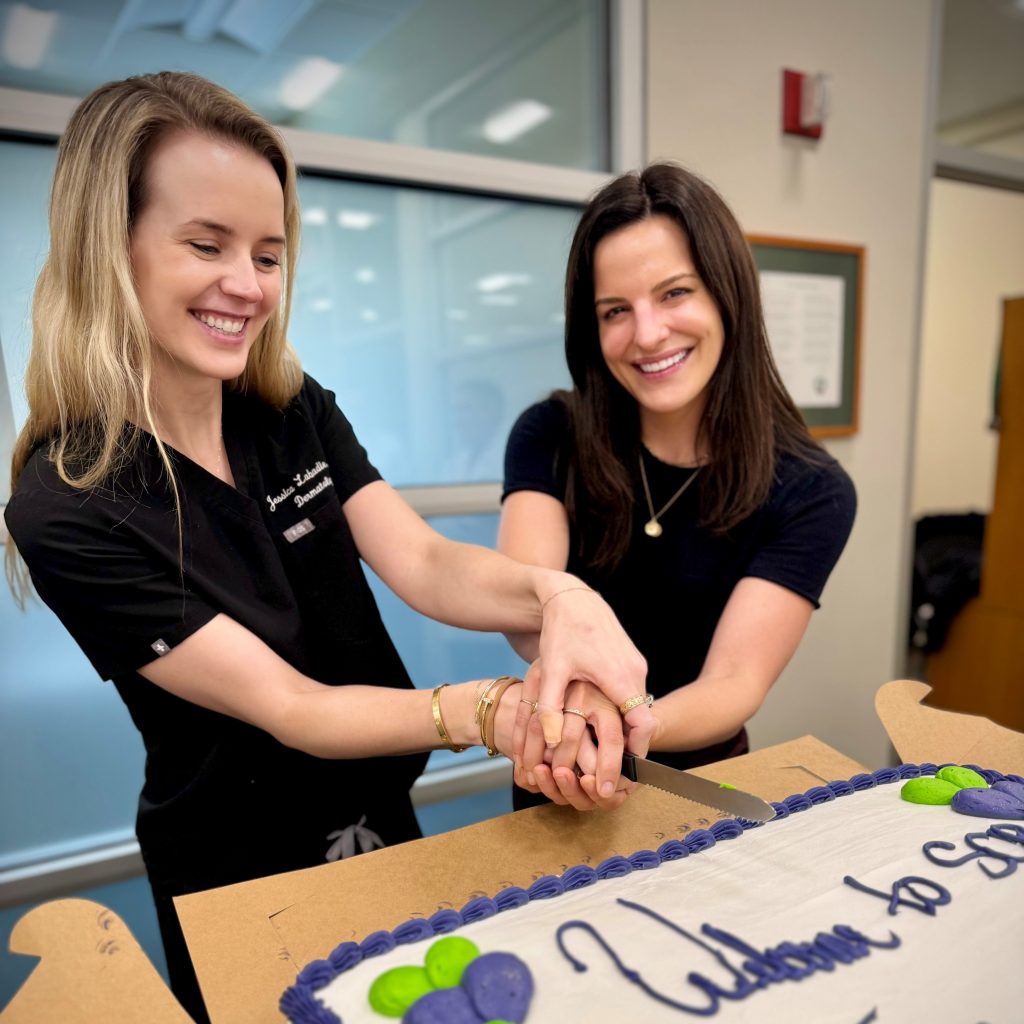 Drs Labadie and Stout cutting their welcoming cake